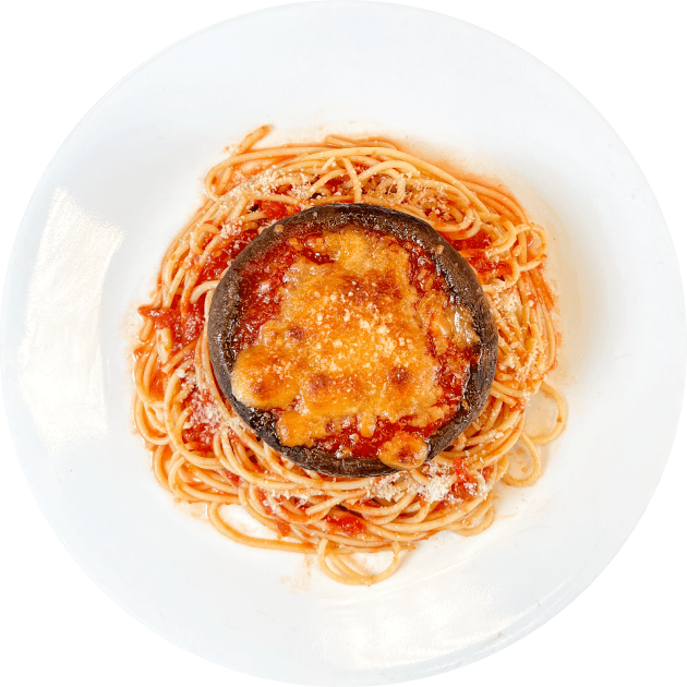 Portobello parmigiana con pasta pomodoro.