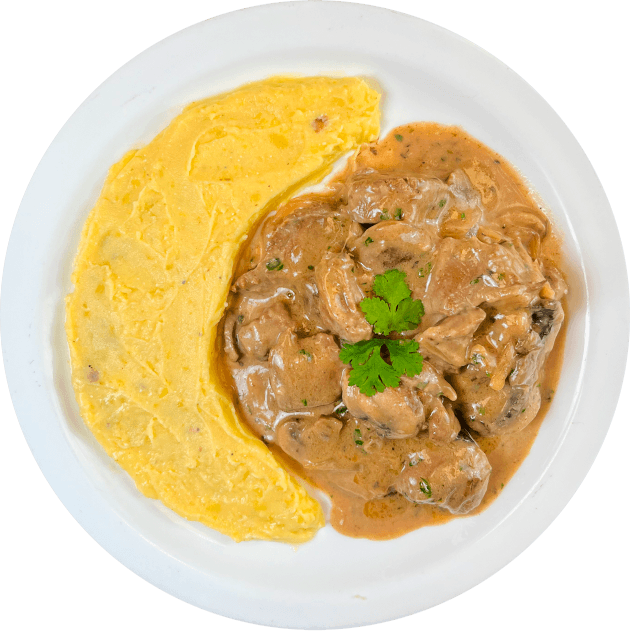 Lomo stroganoff con puré de papa.
